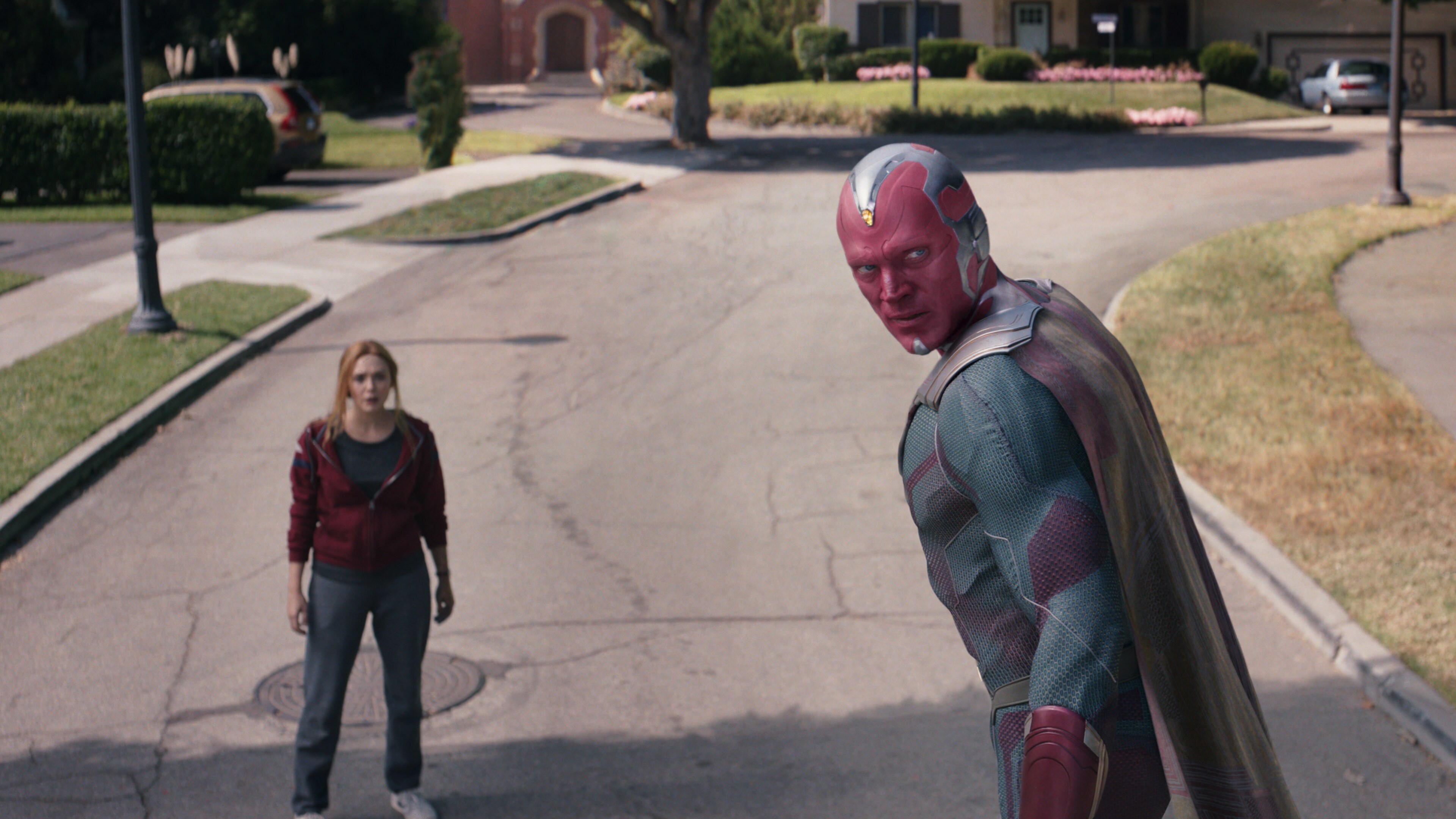 Elizabeth Olsen as Wanda Maximoff and Paul Bettany as Vision in Marvel Studios' WANDAVISION exclusively on Disney+. Photo courtesy of Marvel Studios. ©Marvel Studios 2021. All Rights Reserved.