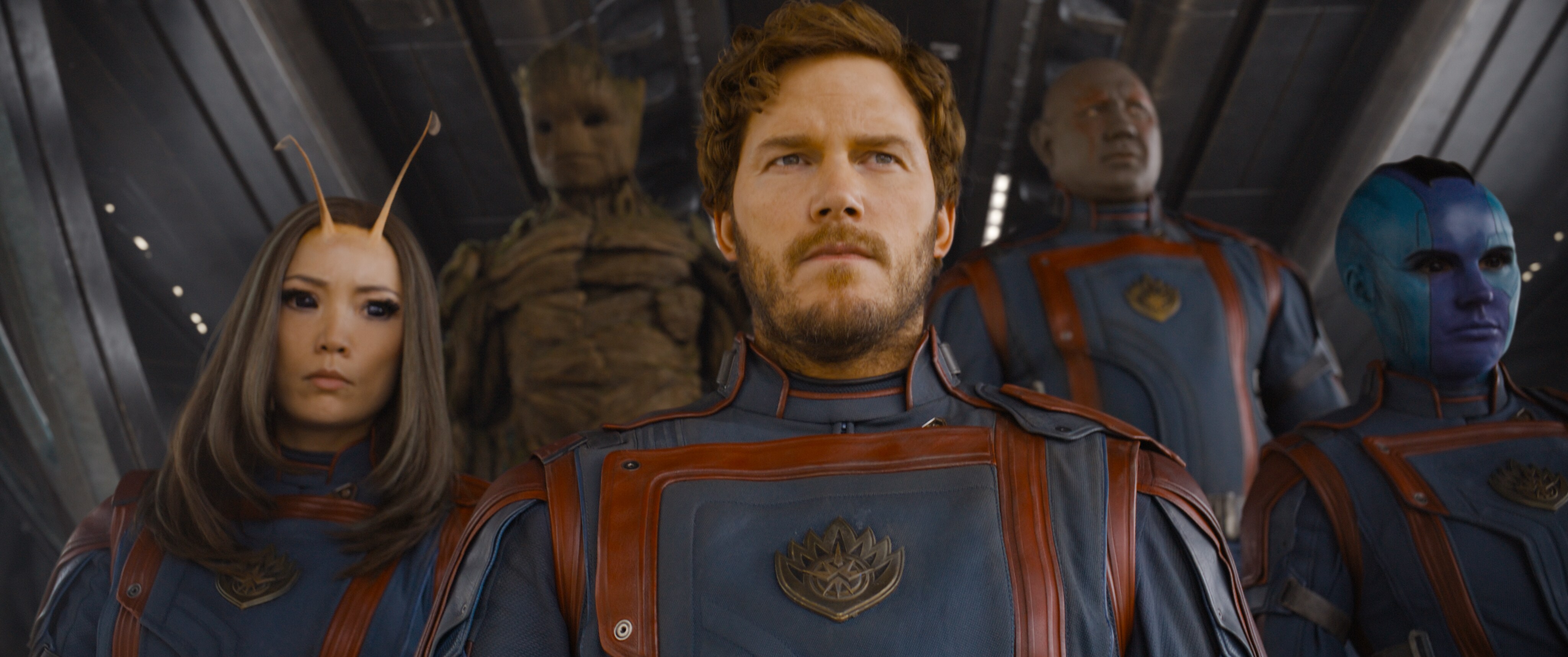 From left: Mantis (Pom Klementieff), Groot (Vin Diesel), Peter Quill (Chris Pratt), Drax (Dave Bautista), and Nebula (Karen Gillan) in matching blue-leather Guardians uniforms