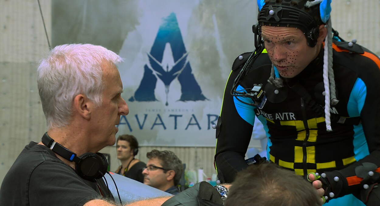 Image of Director James Cameron and and actor in a wetsuit from the documentary, "Fire and Water: Making The Avatar Films."
