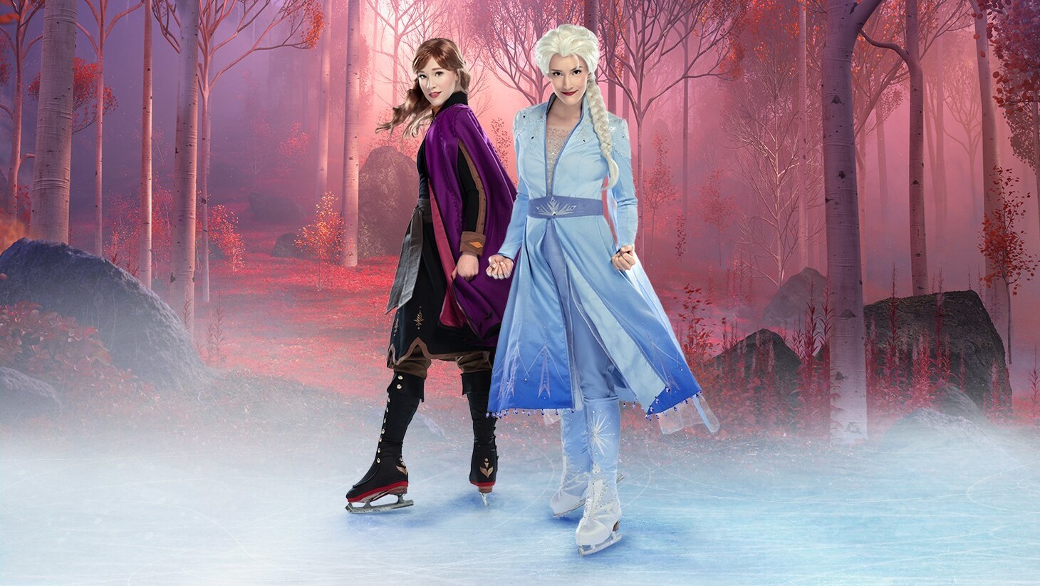 Photo of Disney on Ice performers dressed as Anna and Elsa.