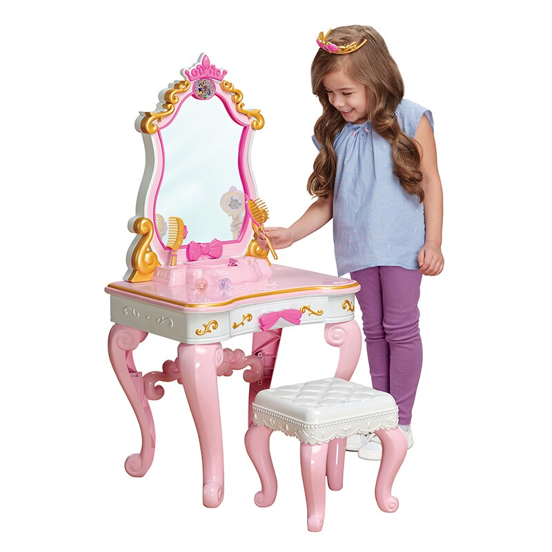 Child plays with Enchanted Messages Musical Vanity toy