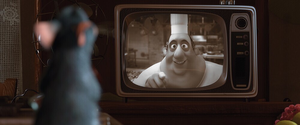 Remy looking at Chef Gusteau in TV in the movie "Ratatouille"