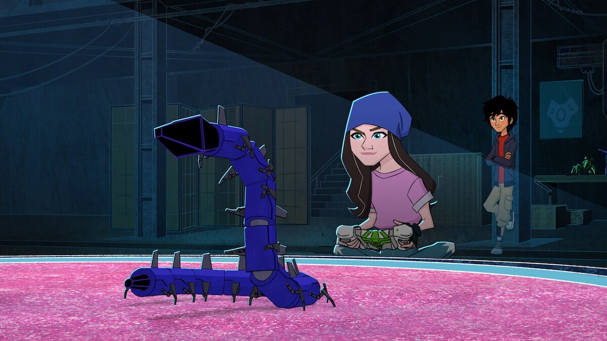 Blue Battle Bot controlled by Trina as Hiro watches