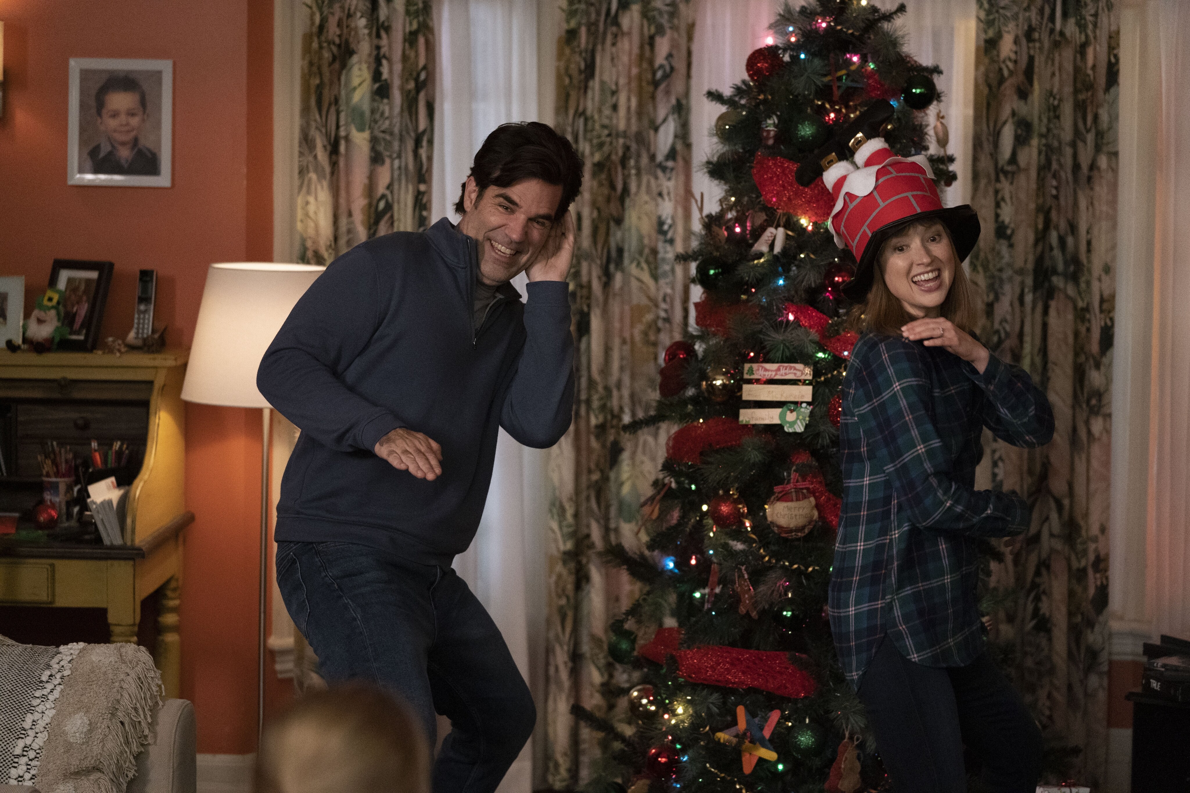 Ellie Kemper and Rob Delaney as Pam and Jeff McKenzie
