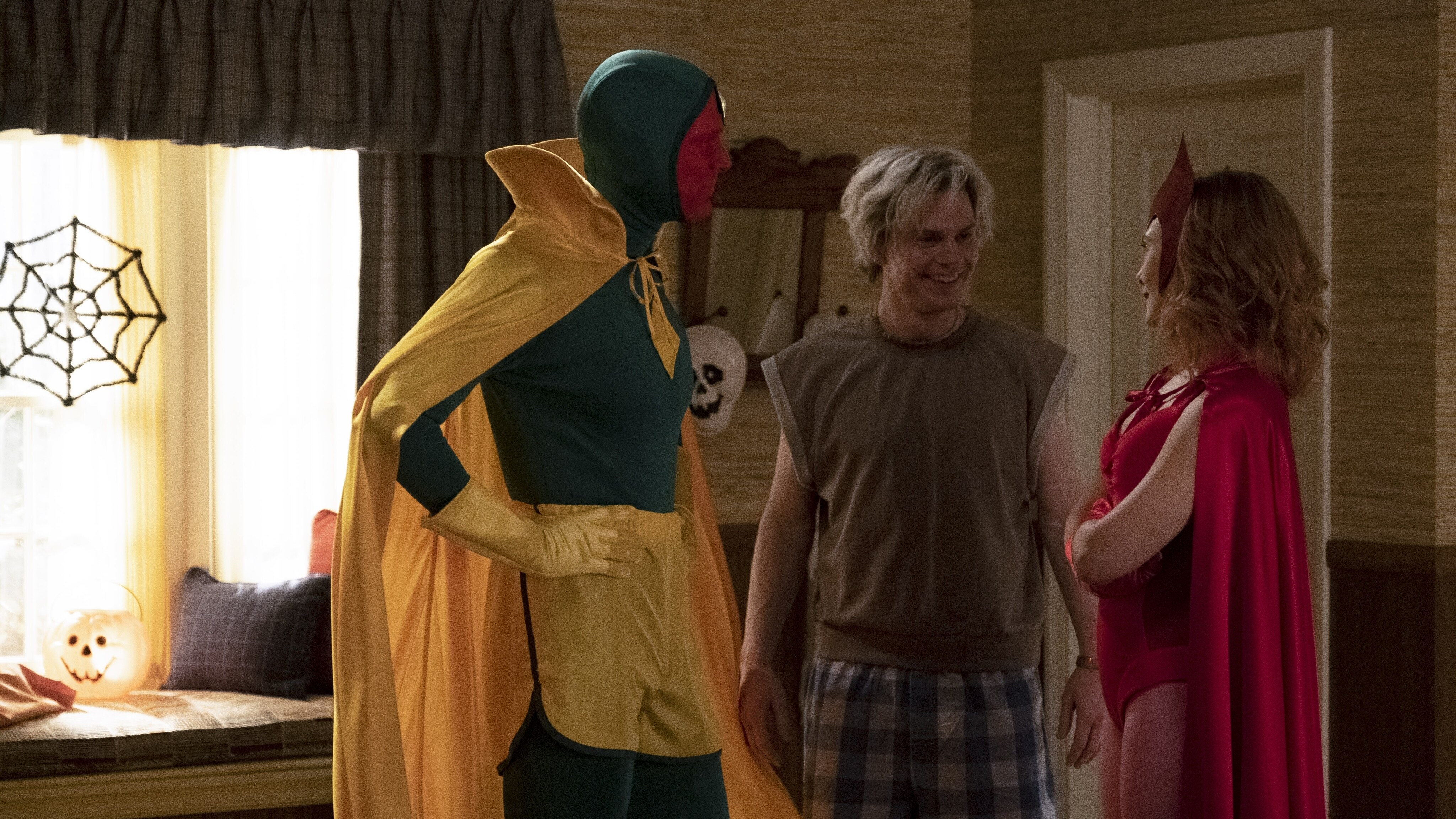 (L-R): Paul Bettany as Vision, Evan Peters as Pietro and Elizabeth Olsen as Wanda Maximoff in Marvel Studios' WANDAVISION exclusively on Disney+. Photo by Chuck Zlotnick. ©Marvel Studios 2021. All Rights Reserved.