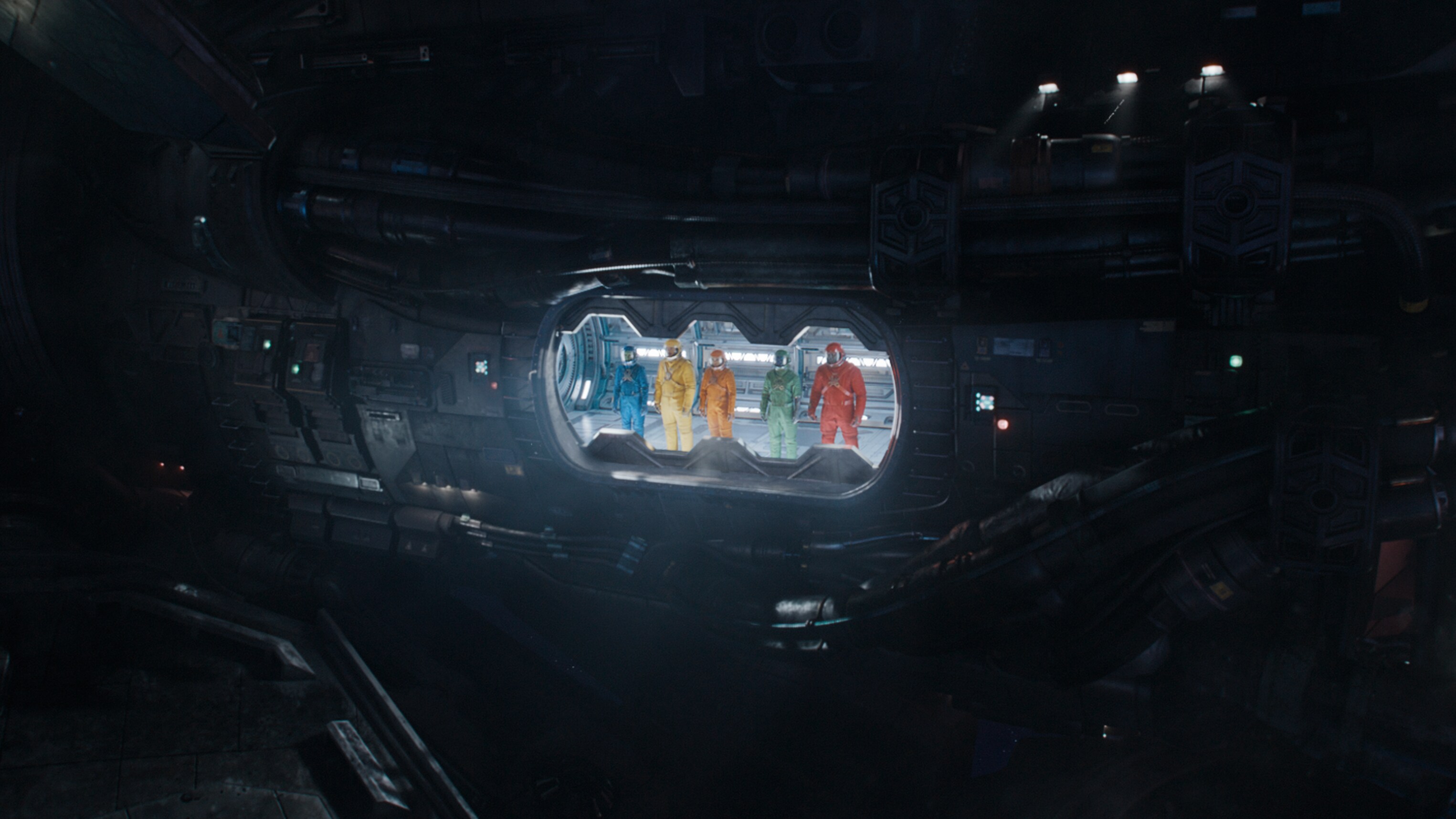 Guardians in coloured suits on spaceship.