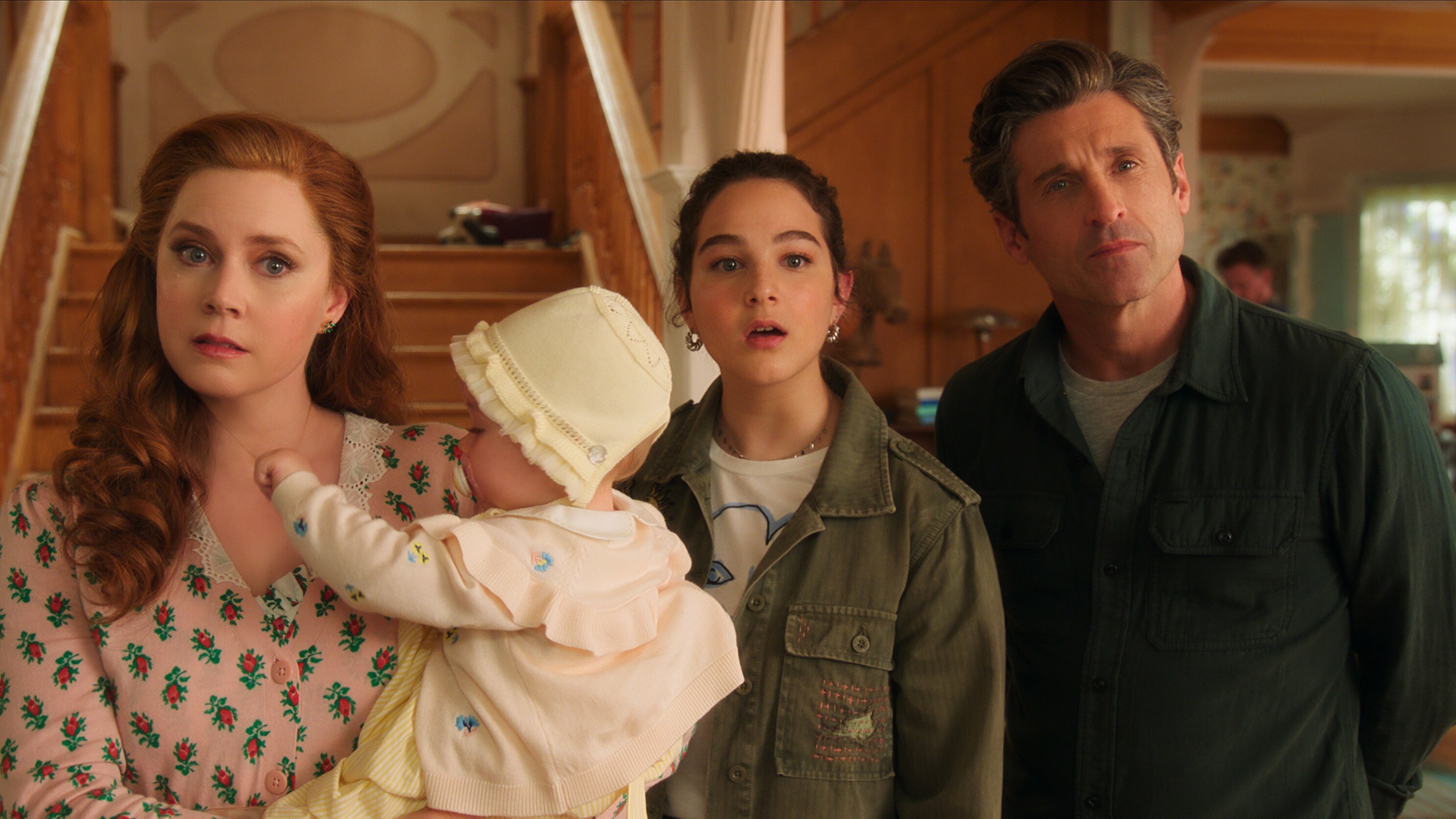 (L-R): Amy Adams as Giselle, Sofia (played by Mila & Lara Jackson),  Gabriella Baldacchino as Morgan Philip, and Patrick Dempsey as Robert Philip in Disney's live-action DISENCHANTED, exclusively on Disney+. Courtesy of Disney Enterprises; Inc. © 2022 Disney Enterprises, Inc. All Rights Reserved.