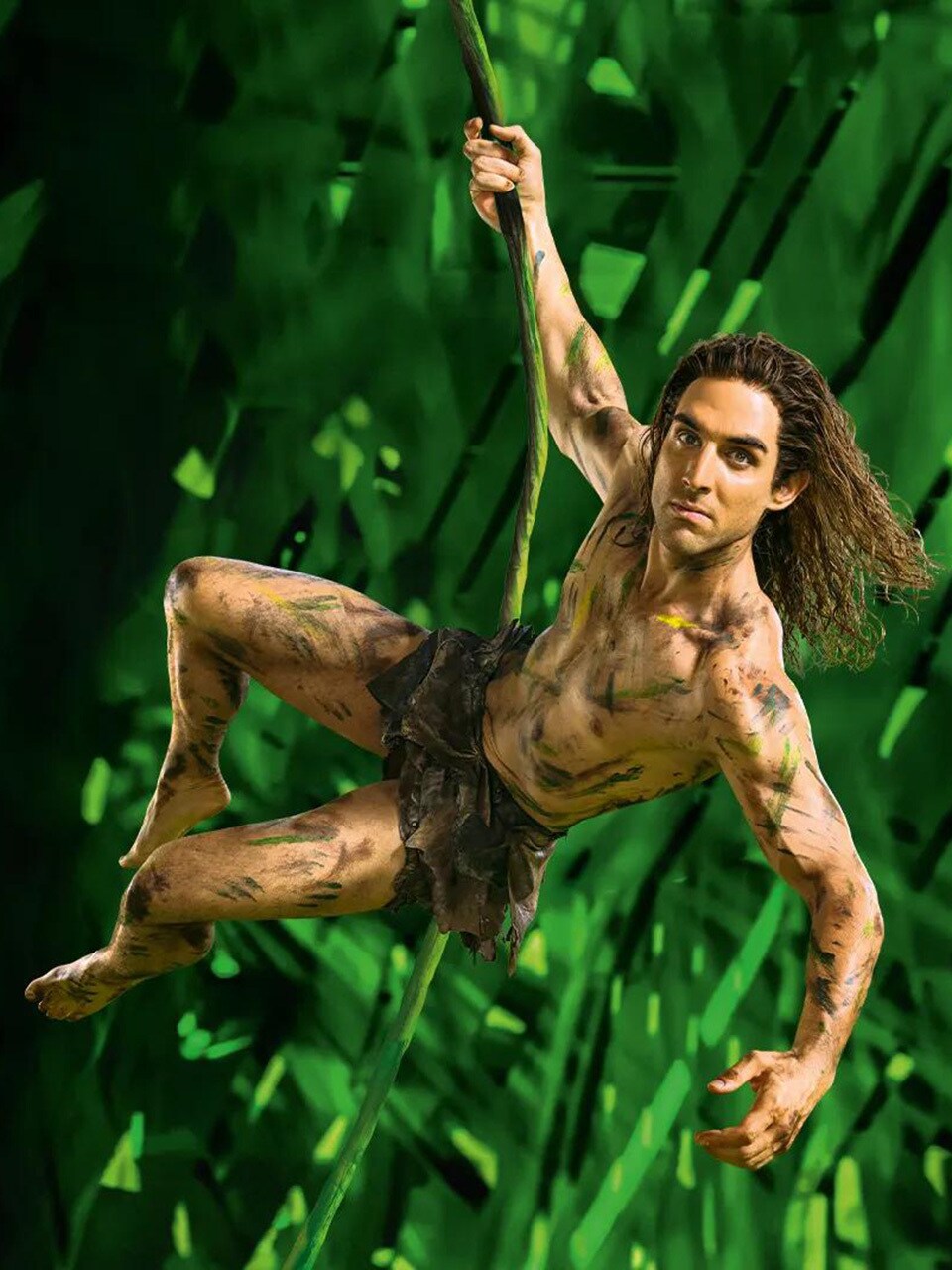 Tarzan schwingt an einer Liane.