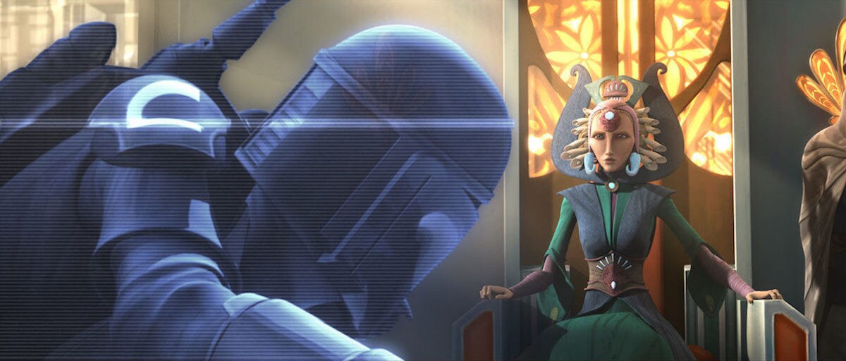 Satine Kryze observing a hologram of a Mandalorian warrior