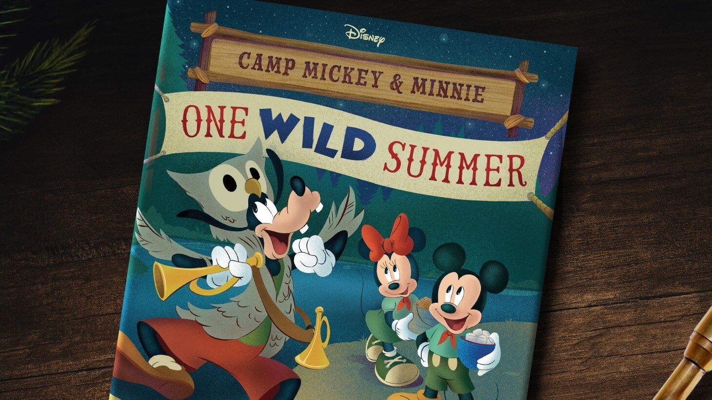 Disney | Camp Mickey & Minnie: One Wild Summer book cover featuring Goofy, Mickey Mouse, and Minnie Mouse.