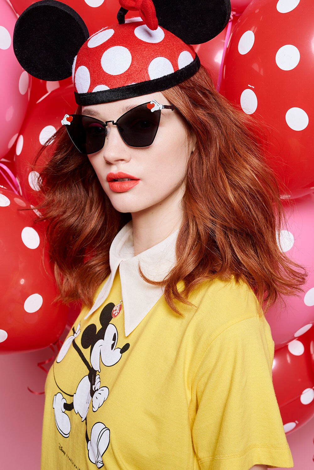 Model wearing products from the limited edition Disney x Karen Walker collection