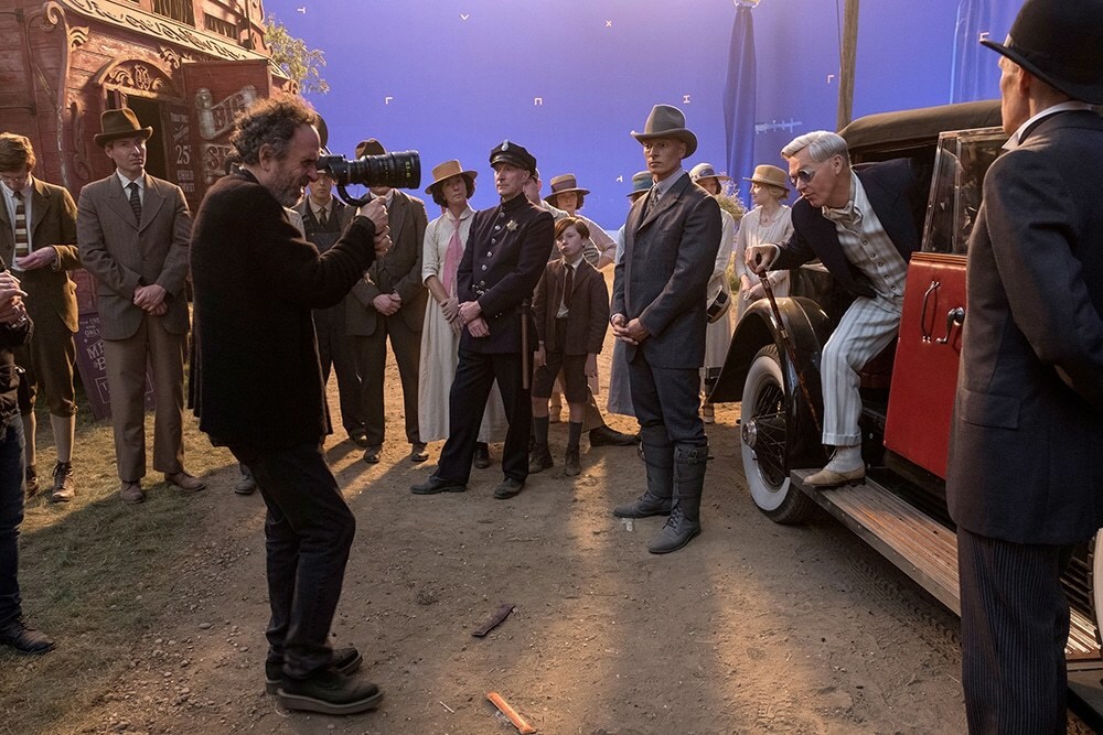 tim burton and cast on the set of dumbo