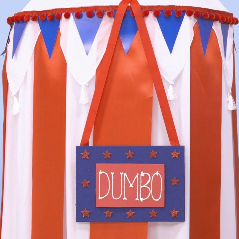 A circus tent with Dumbo written on the front