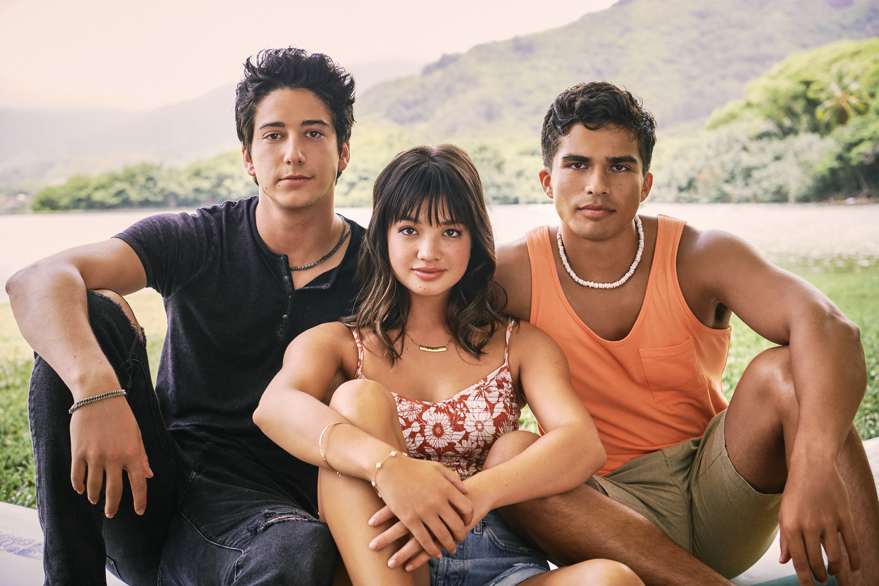 Lahela Kamealoha (Peyton Elizabeth Lee) sits with Walter (Alex Aiono) to the right and Nico (Milo Manheim) to the left