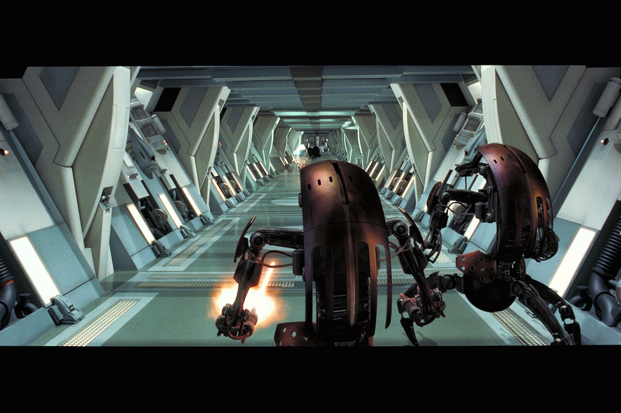 Qui-Gon and Obi-Wan held off the powerful droids’ barrage of blaster fire, but were unable to pen...