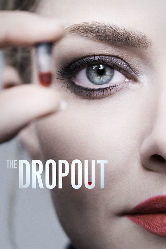 A zoomed in shot of half the face of the main character of The Dropout, holding an out of focus pill.