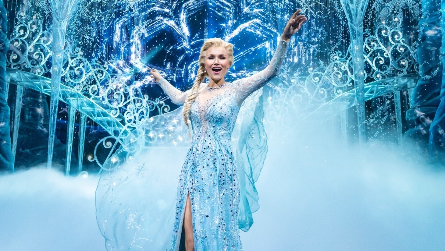 An actress performing on stage in Frozen the Musical
