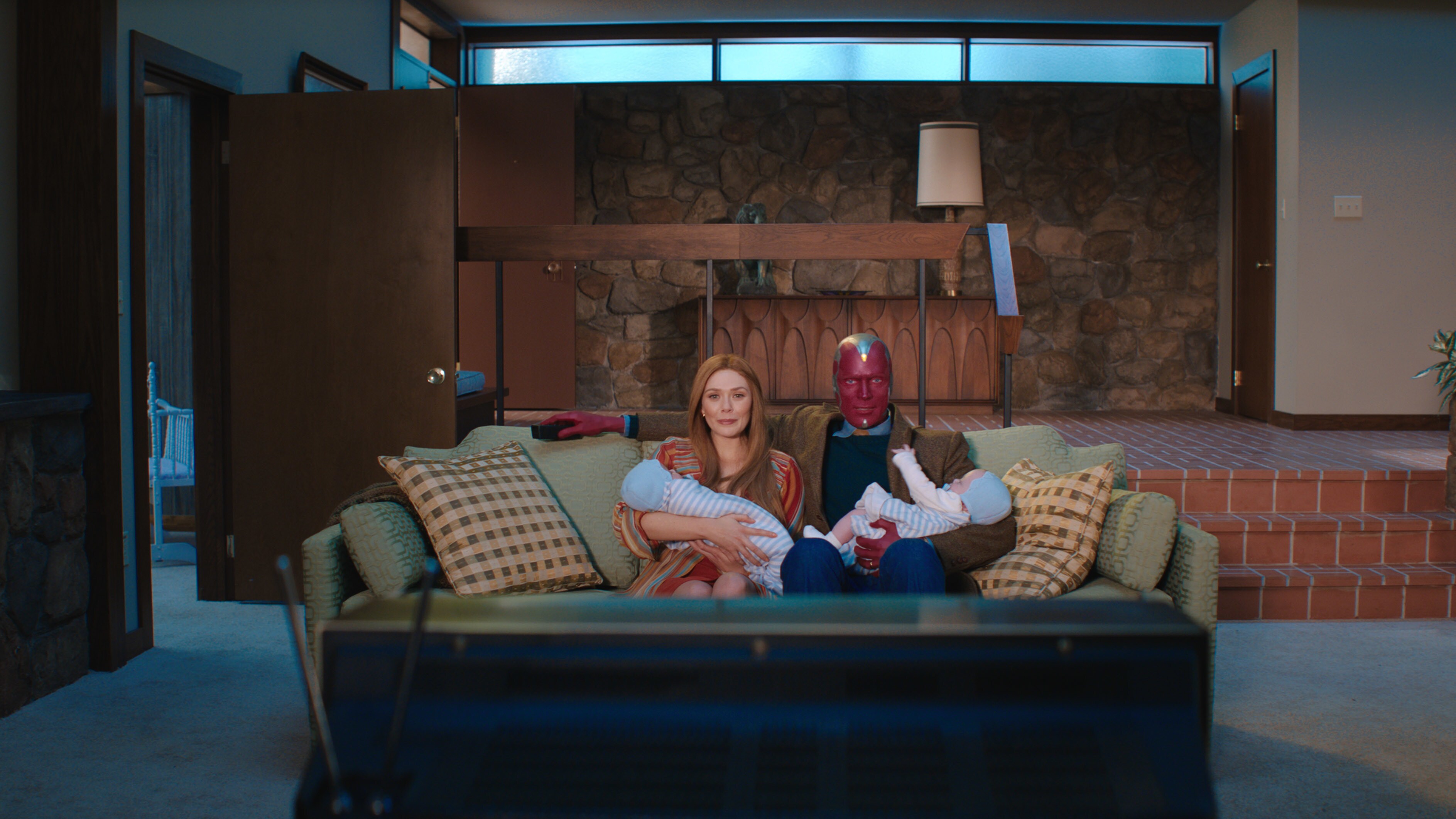 (L-R): Elizabeth Olsen as Wanda Maximoff and Paul Bettany as Vision in Marvel Studios' WANDAVISION exclusively on Disney+. Photo courtesy of Marvel Studios. ©Marvel Studios 2021. All Rights Reserved.