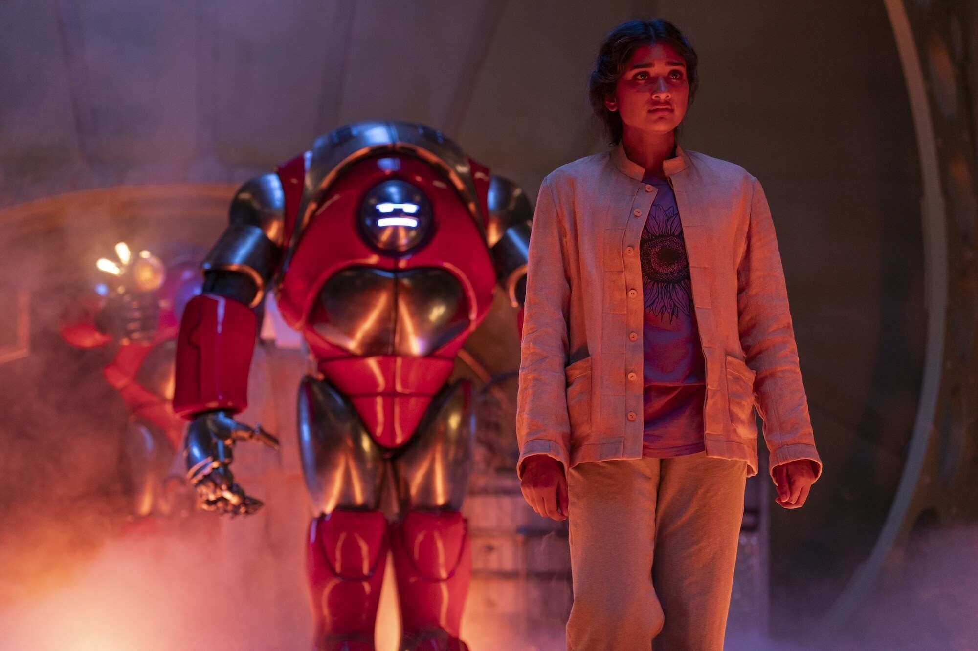 Picture Shows: Robot and Belinda Chandra (Varada Sethu) Alistair Heap/BBC Studios/Disney/Bad Wolf