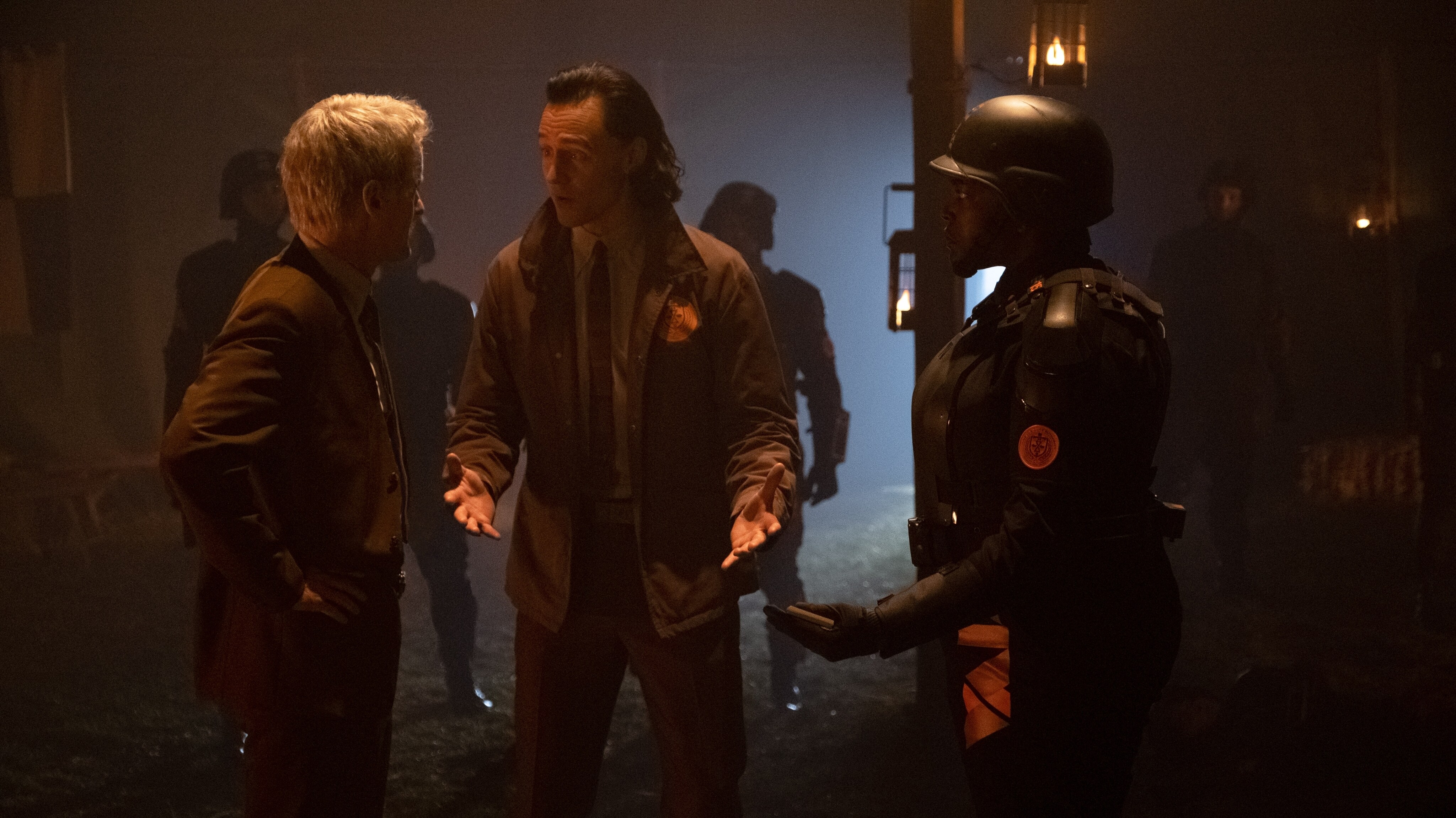 (L-R): Mobius (Owen Wilson), Loki (Tom Hiddleston) and Hunter B-15 (Wunmi Mosaku) in Marvel Studios' LOKI, exclusively on Disney+. Photo by Chuck Zlotnick. ©Marvel Studios 2021. All Rights Reserved.