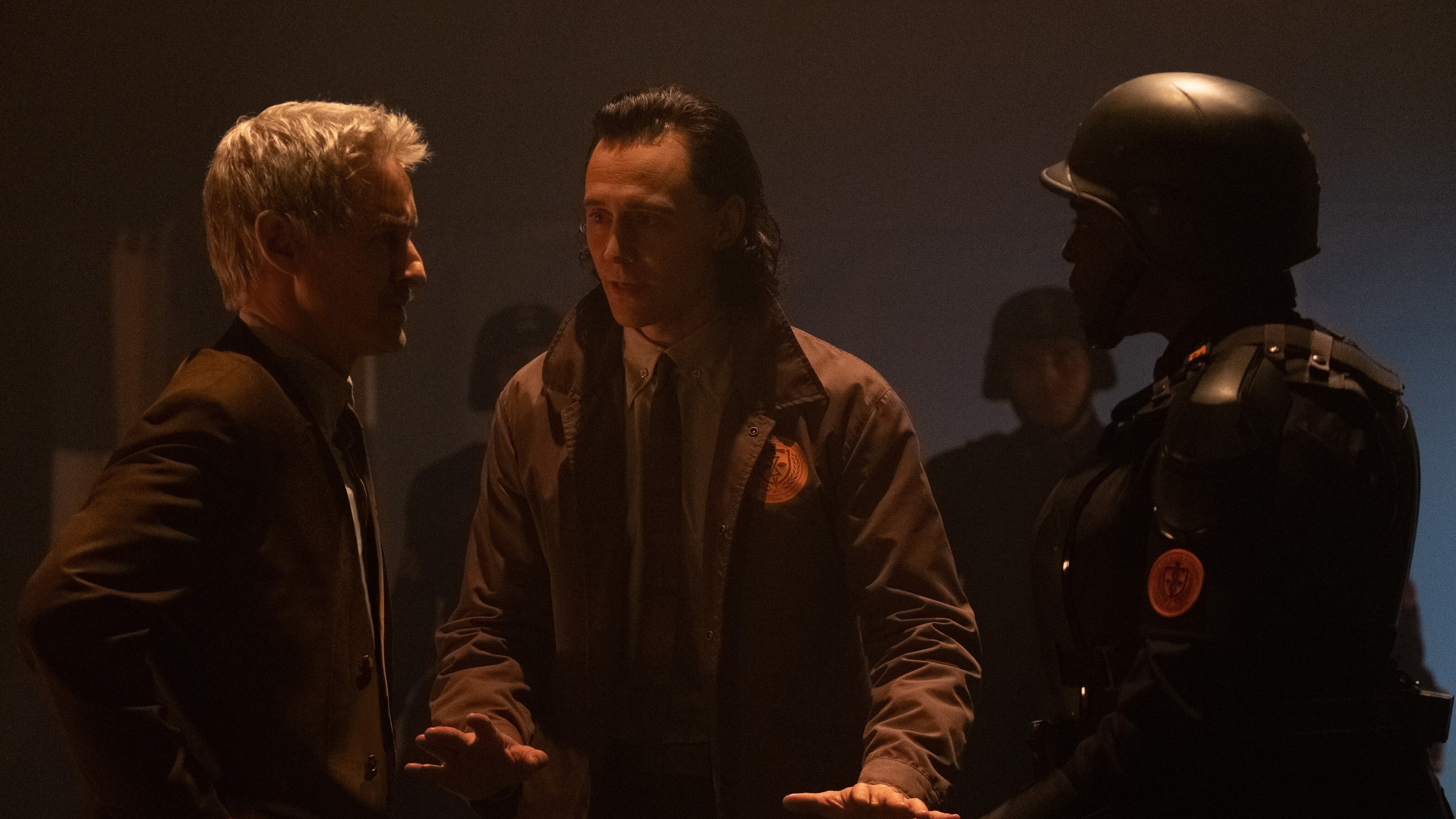 (L-R): Mobius (Owen Wilson), Loki (Tom Hiddleston) and Hunter B-15 (Wunmi Mosaku) in Marvel Studios' LOKI, exclusively on Disney+. Photo by Chuck Zlotnick. ©Marvel Studios 2021. All Rights Reserved. 