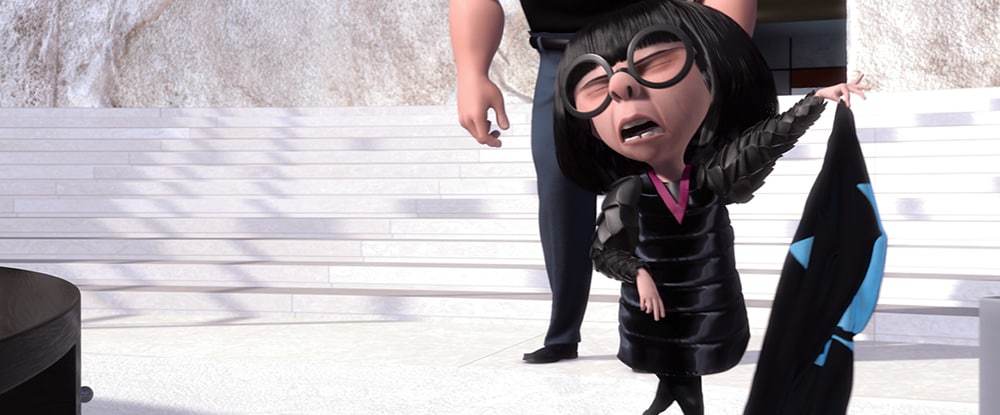 Edna Mode holding a suit in the animated movie "The Incredibles"