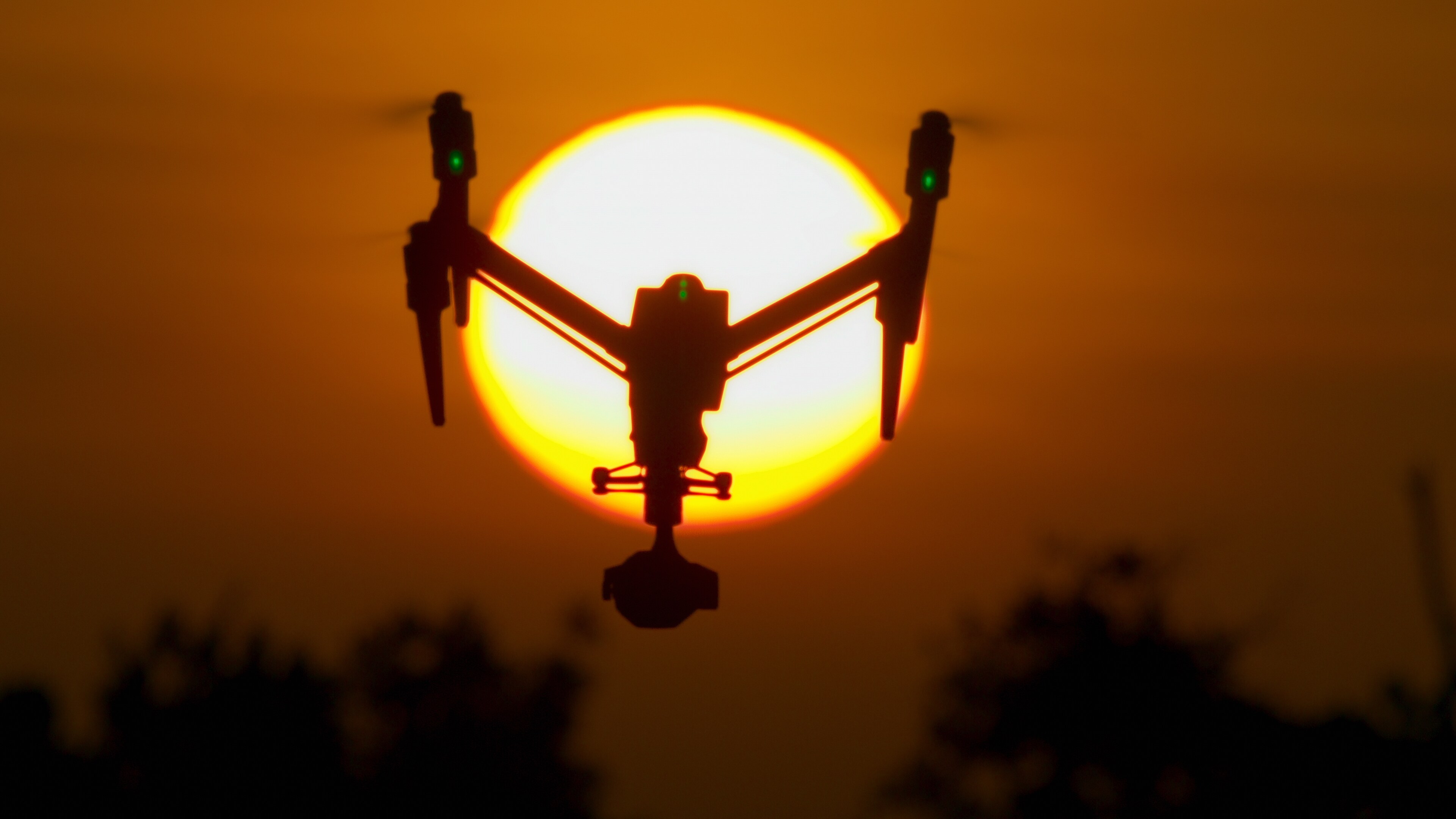 Drone flying with sunset in background. (Credit: National Geographic for Disney+)