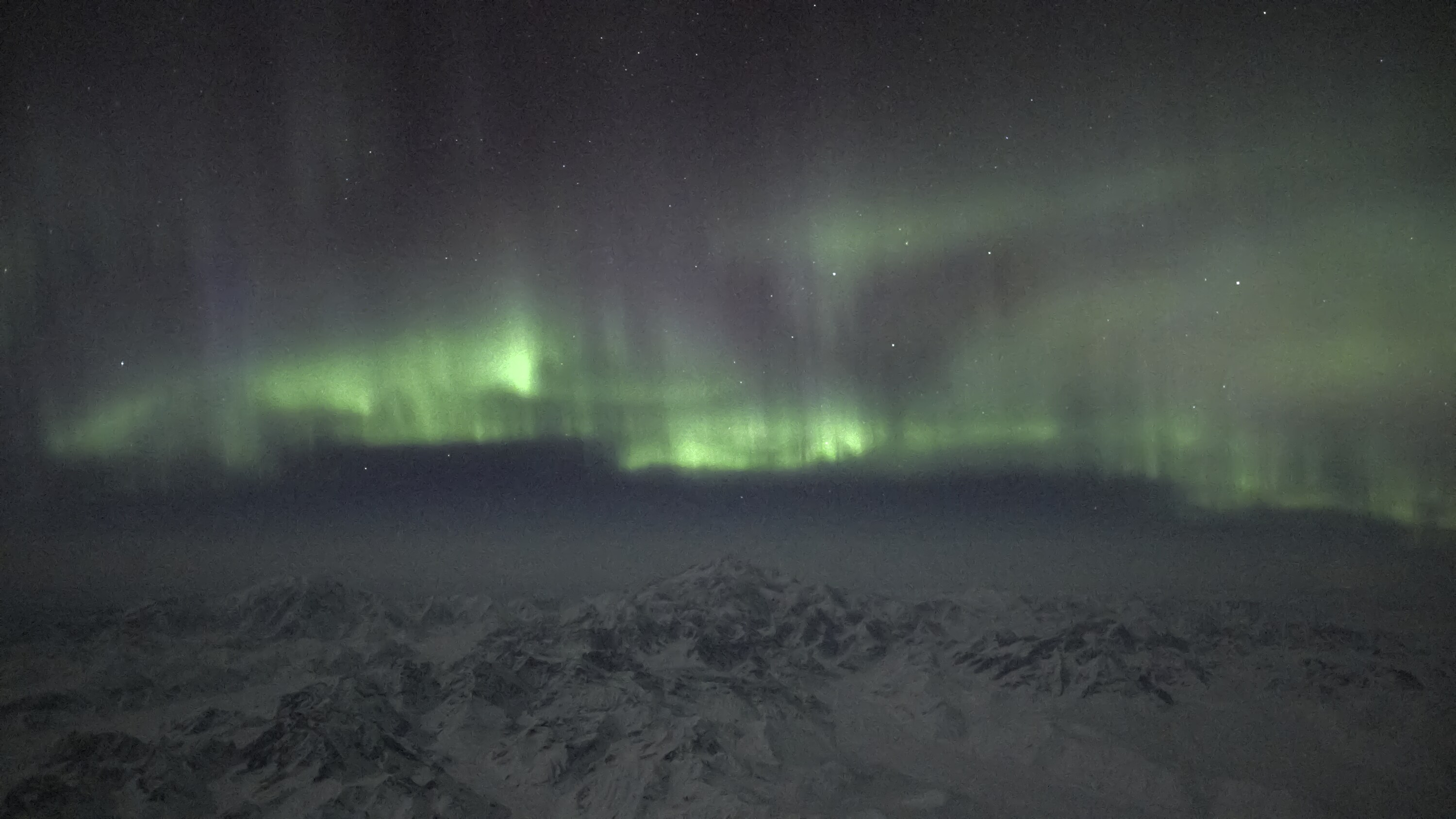 The Northern Lights illuminate the sky above North America's highest peak. (National Geographic for Disney+)