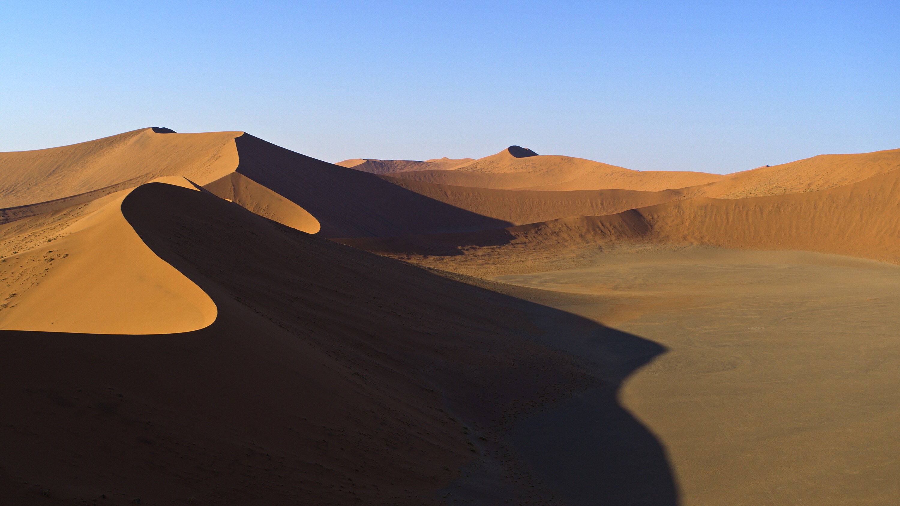 Flying towards red dunes in the Namib-Naukluft Park. (National Geographic for Disney+)