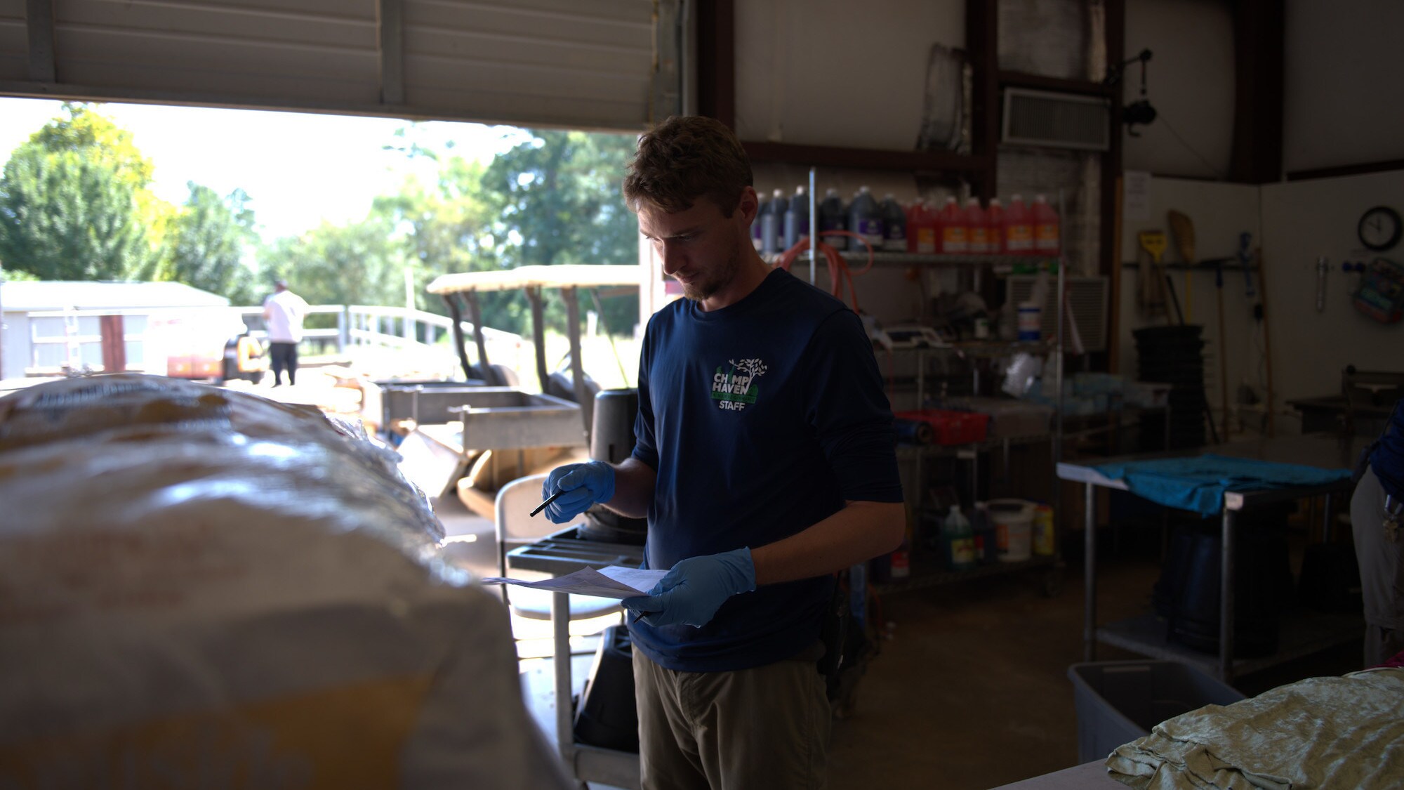 Caregiver Supervisor, Mark, doing inventory. (National Geographic/Haven/Karalee Scouten)