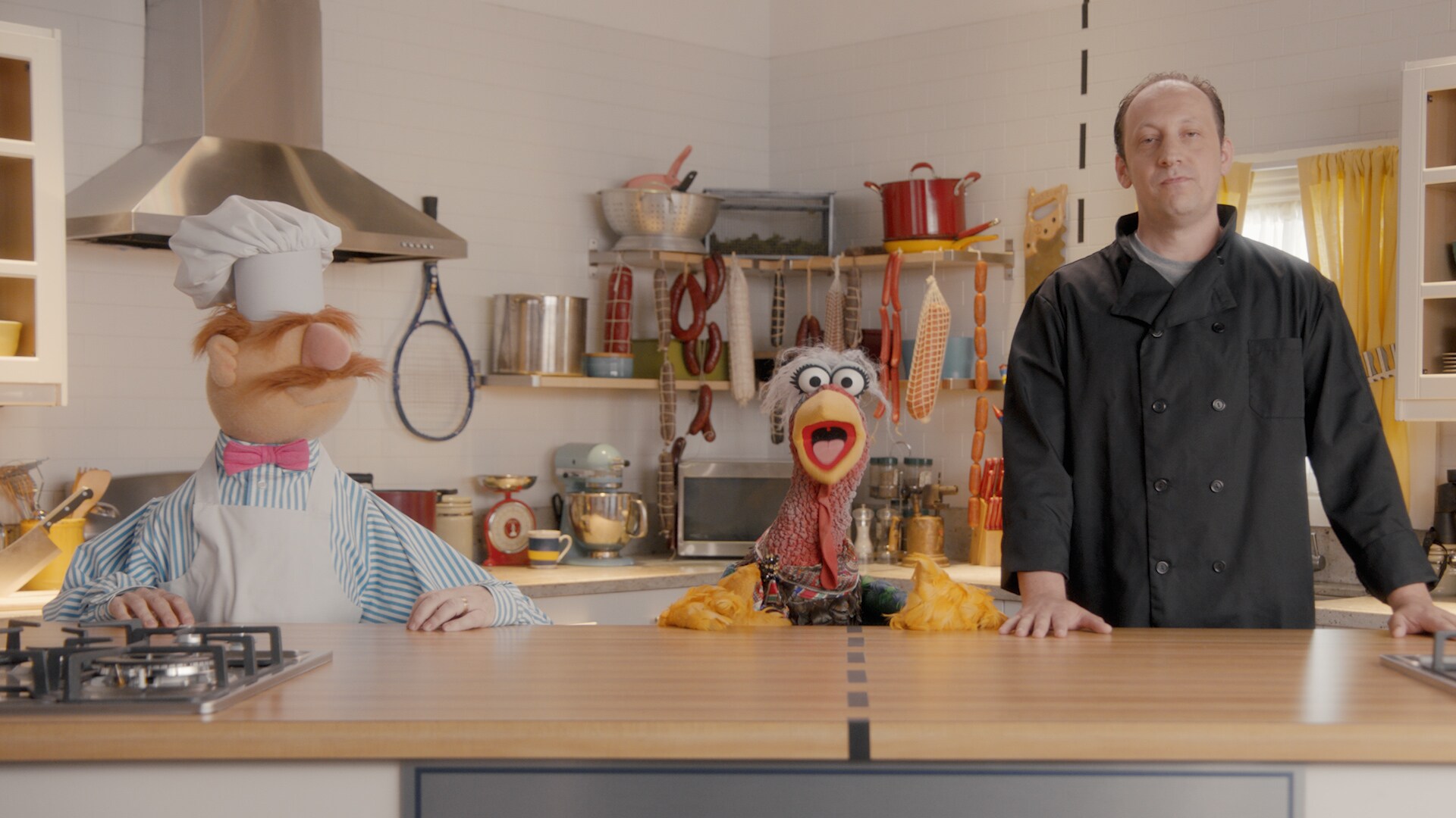 Swedish Chef, Beverly Plume and Chef Giuseppe in “Muppets Now,” streaming only on Disney+