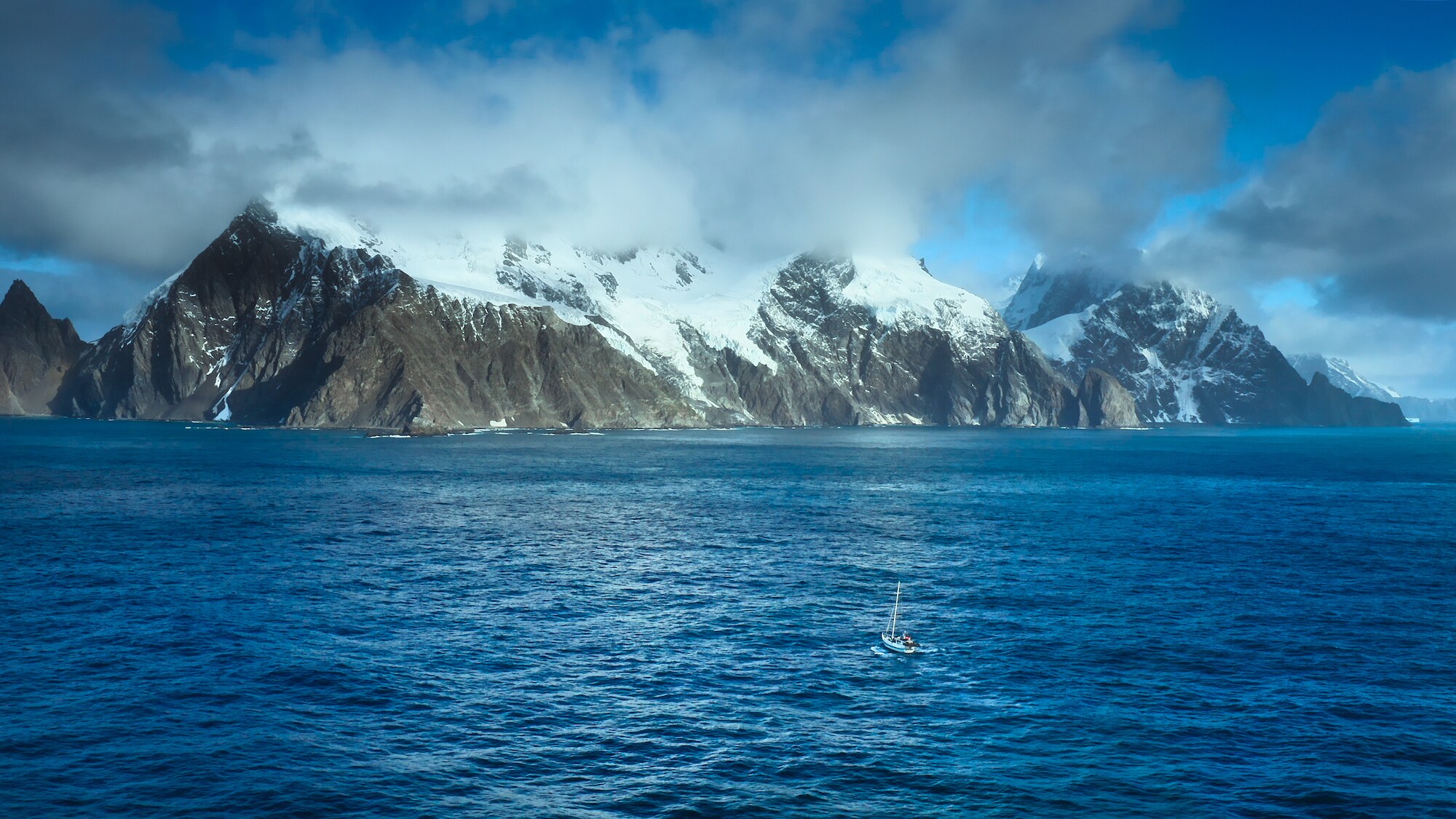 The crew seeks refuge from the brutal Antarctic weather behind Elephant Island. (Credit: National Geographic/Bertie Gregory for Disney+)