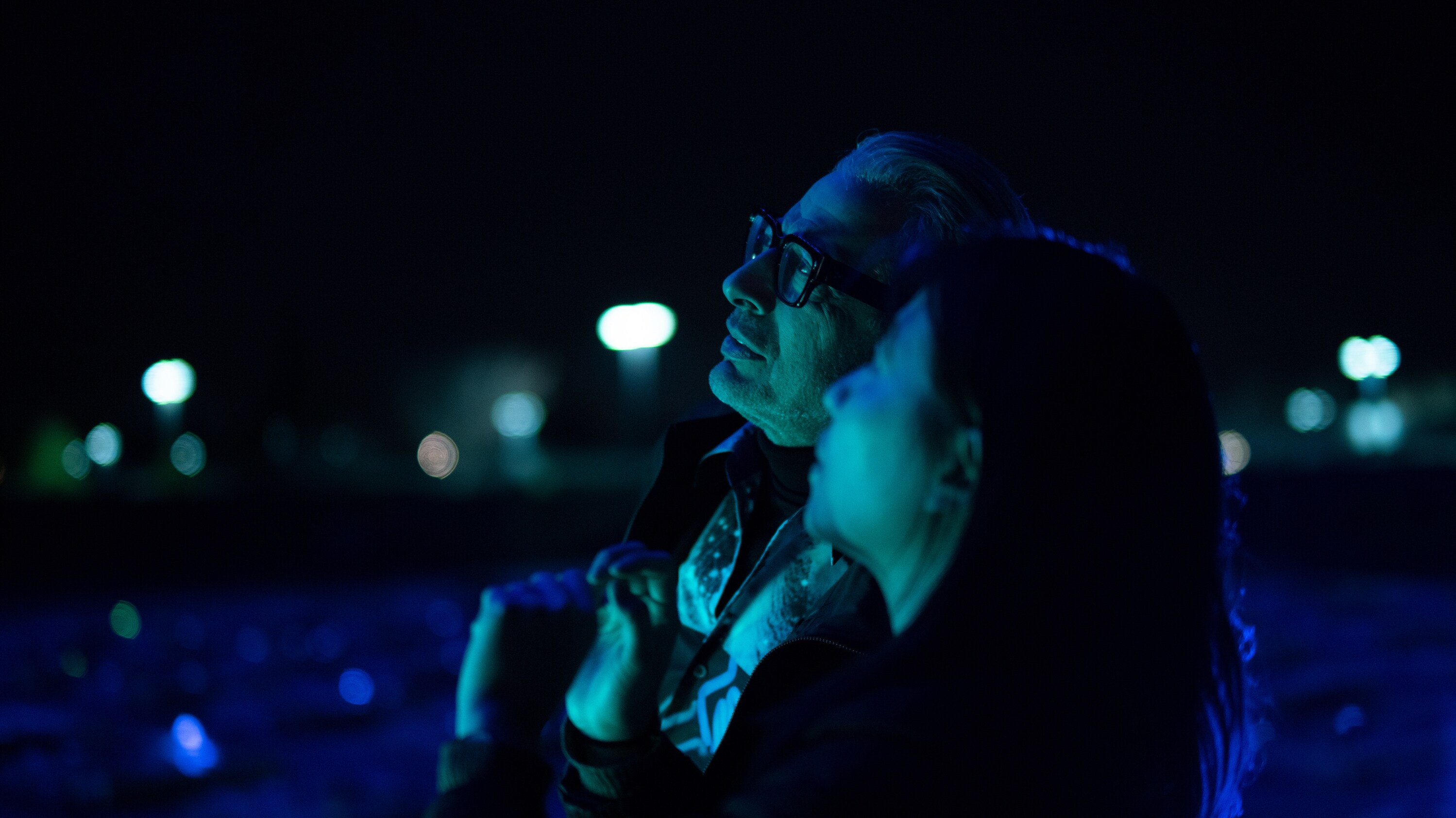Folsom, CA - Jeff Goldblum (L) and Natalie Cheung watch a drone display. (Credit: National Geographic/Justin Koenen)