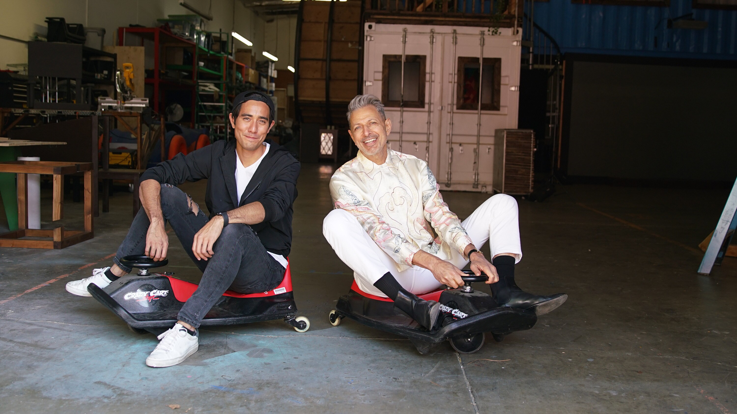 Los Angeles, CA - Jeff Goldblum (R) and Zach King on low dollies. (Credit: National Geographic)