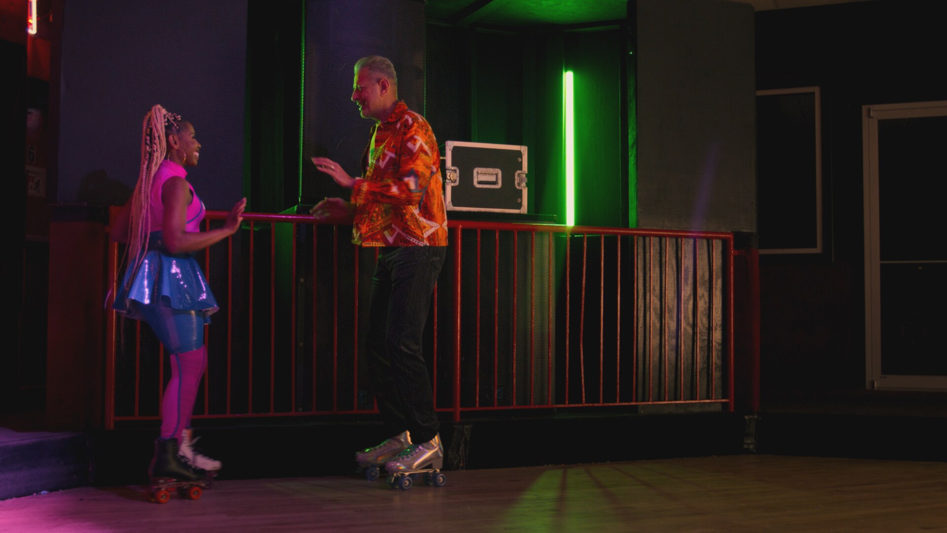 Jeff Goldblum (R) learning to skate with MsssKamille. (Credit: National Geographic)