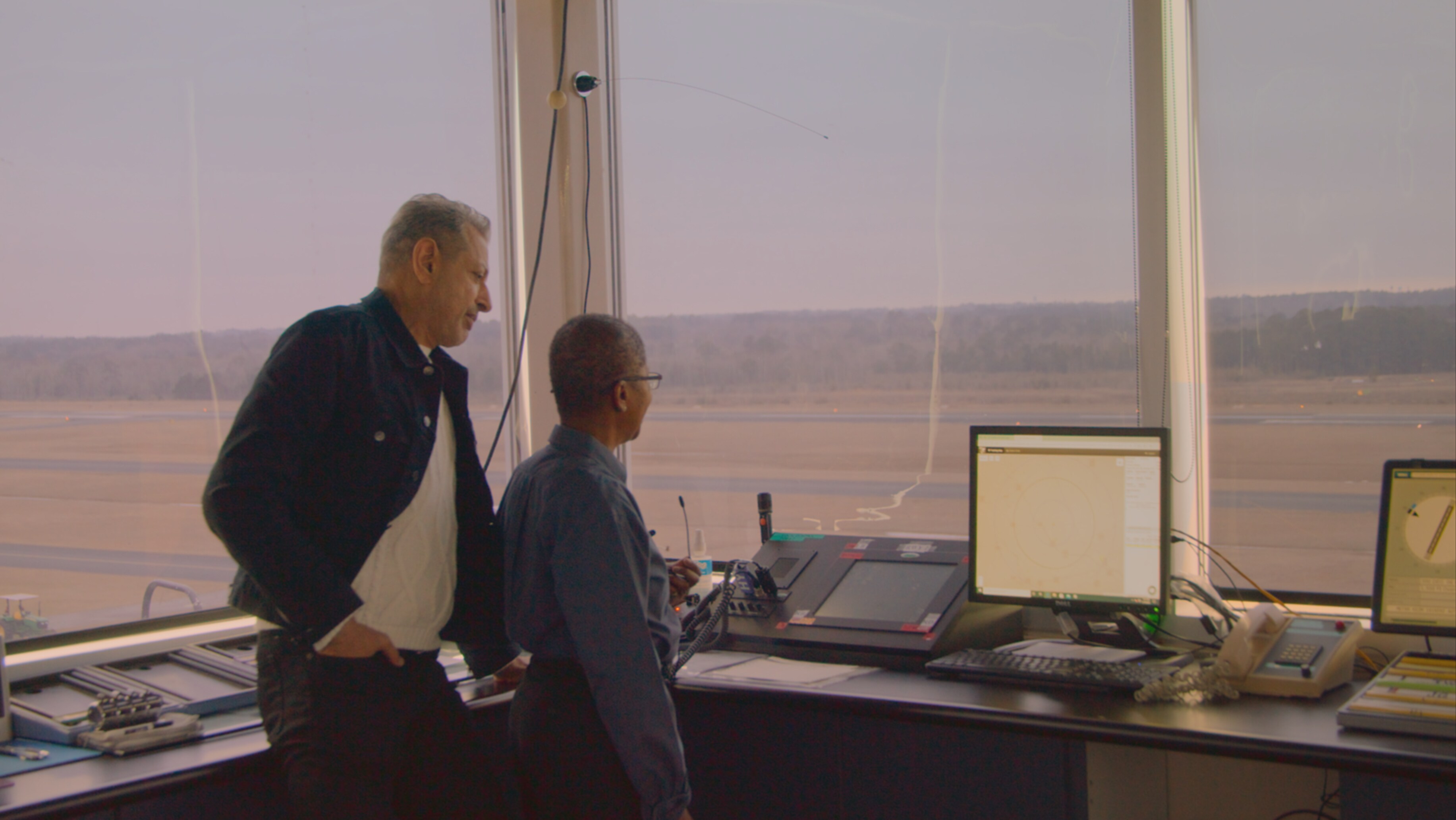 Jeff Goldblum (L) speaks with Air Traffic Control Professor, Angela Taylor. (Credit: National Geographic)