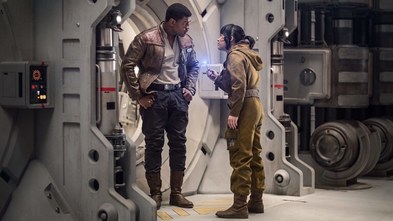 Rose Tico points her electro-shock prod at Finn.