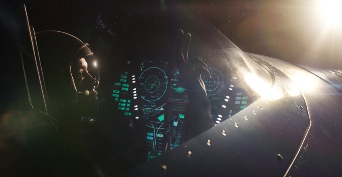 Carol Danvers (played by Brie Larson) in a spaceship looking out