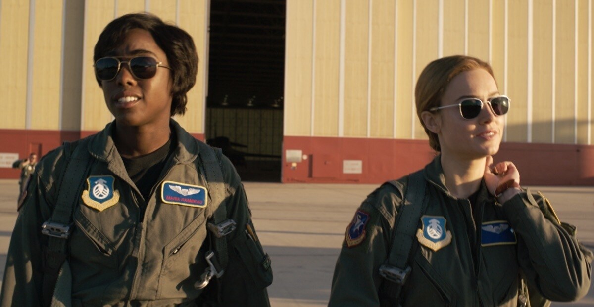 Carol Danvers and Maria Rambeau walking out of an Air Force hangar