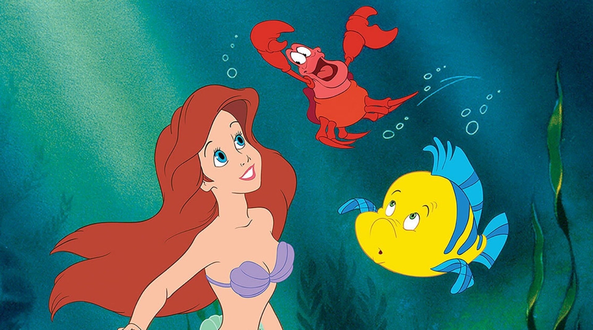 Una imagen de Ariel, Flounder y Sebastián de La sirenita.