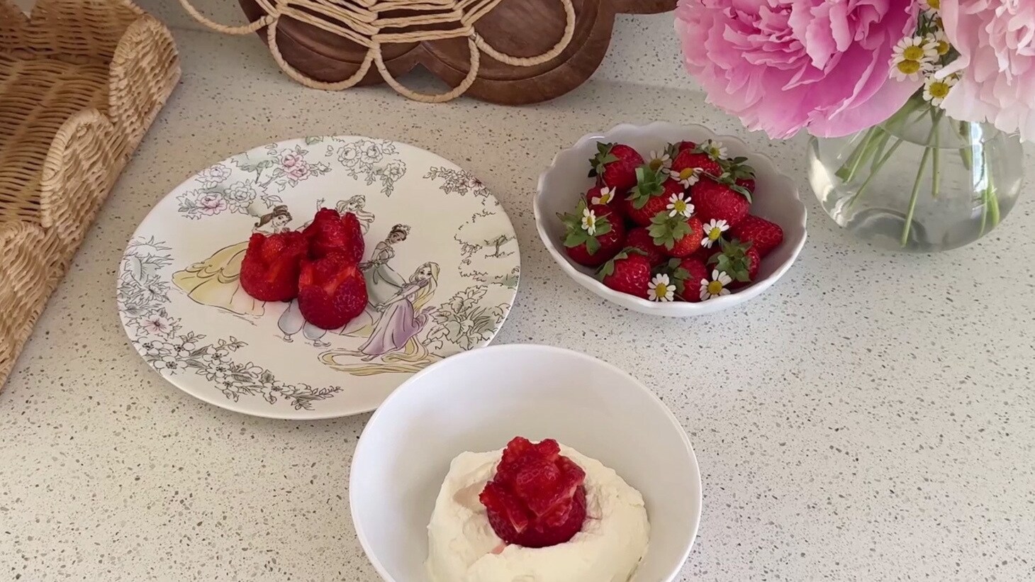 Strawberry rose treats inspired by Belle from Disney’s Beauty and the Beast, featuring a princess-themed plate, fresh strawberries and pink peonies.