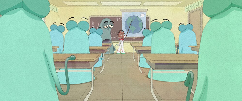 Young girl presents in classroom of green aliens