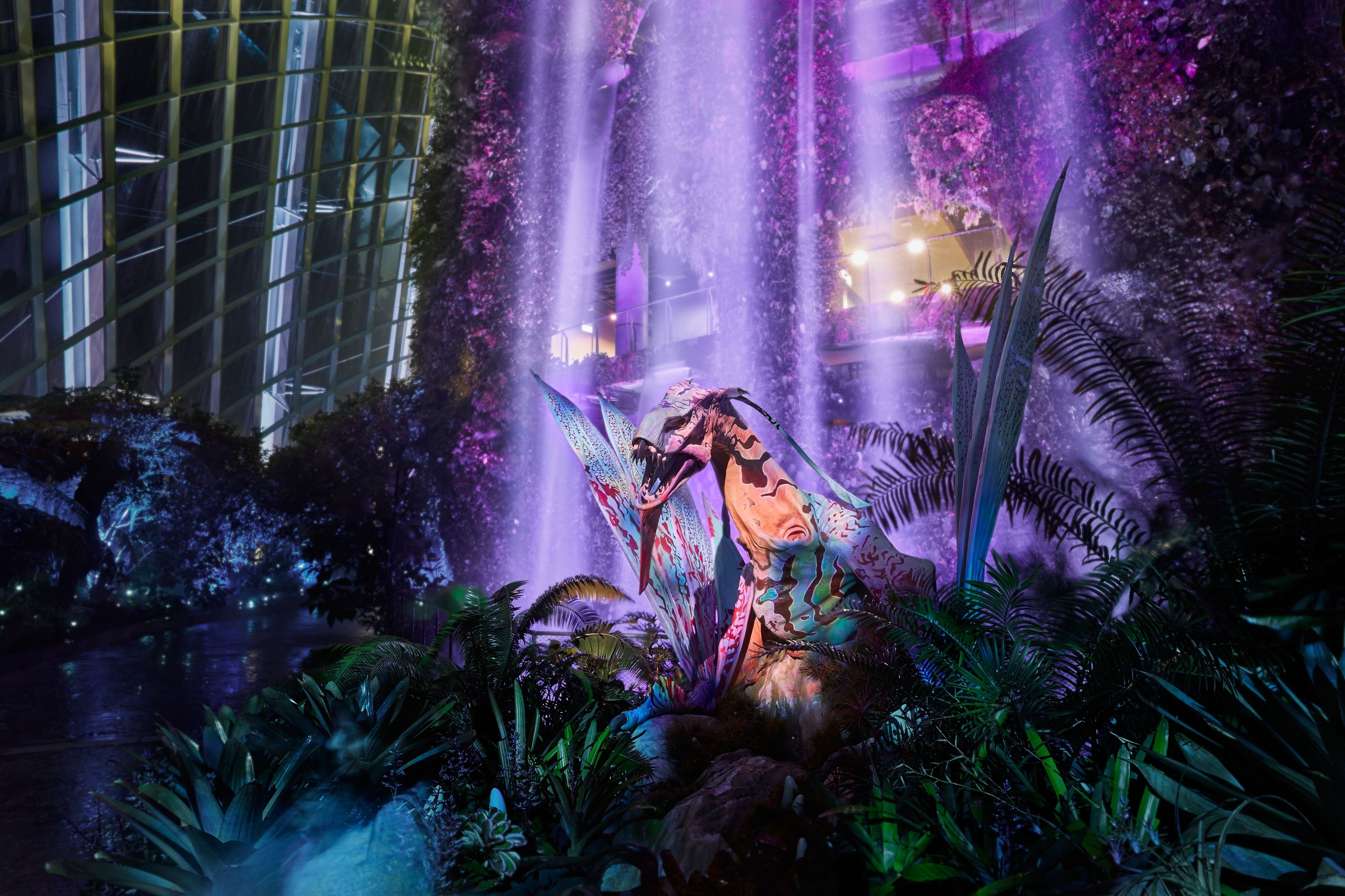 A banshee in front of a cascading waterfall.