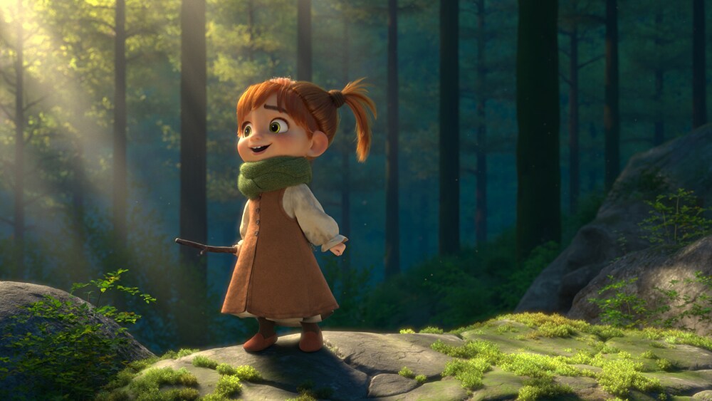 Little girl in the woods holding a twig from the short film Fetch