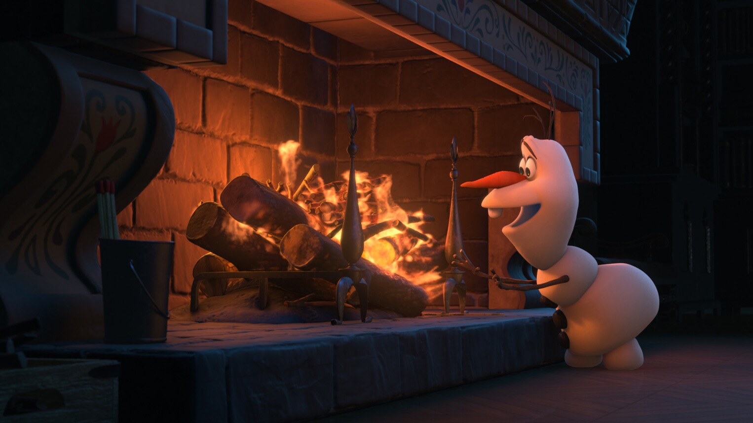 Still image of Olaf in front of the fire 