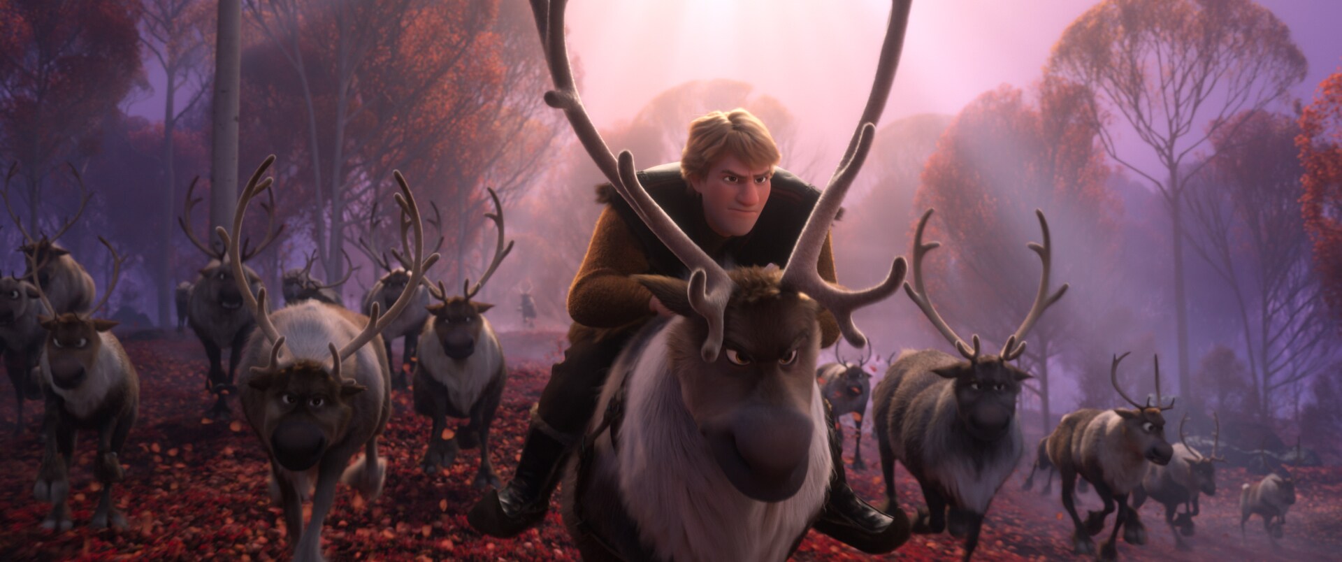 Kristoff riding on a reindeer amongst a herd reindeer 