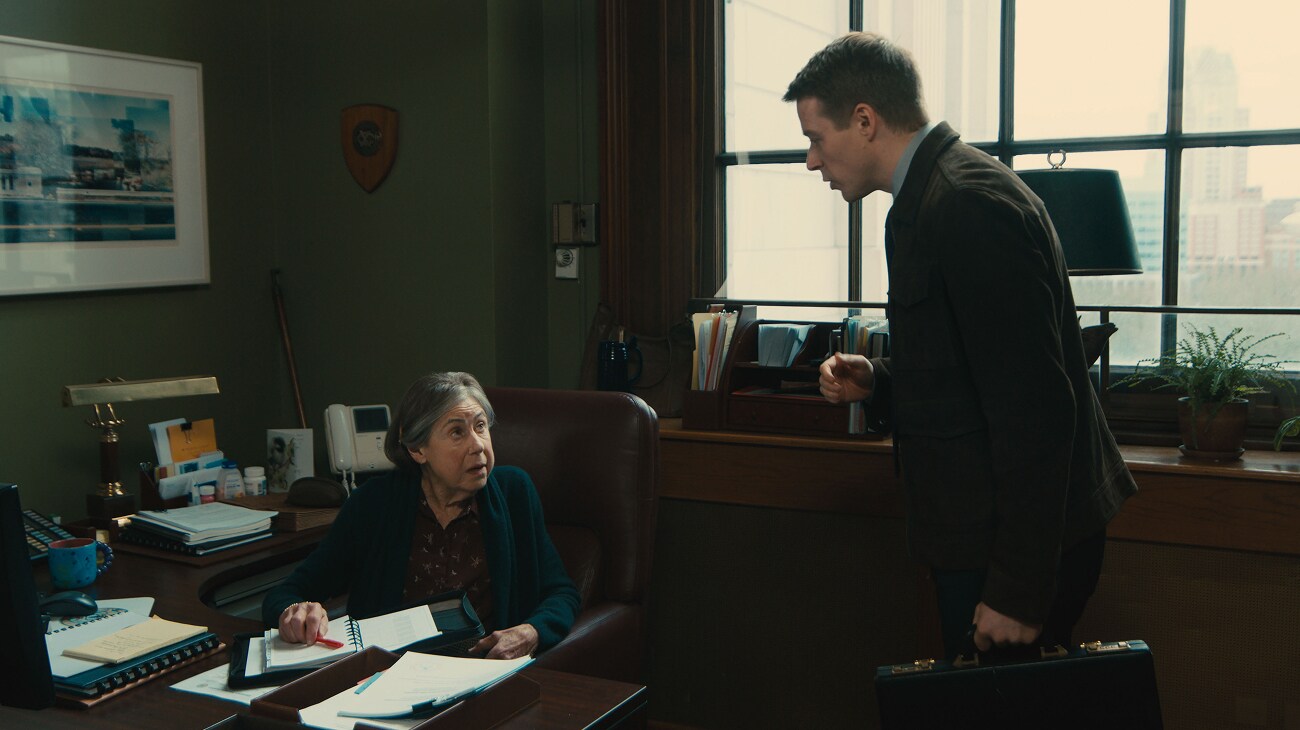 (L-R) Julie Kavner as Estelle and Jack Lowden as Ryan in 20th Century Studios' ELLA MCCAY. Photo courtesy of 20th Century Studios. © 2025 20th Century Studios. All Rights Reserved.