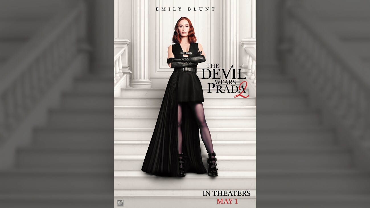 Emily Blunt standing on a white staircase in a black dress. | The Devil Wears Prada 2 | May 1 | © 2026 20th Century Studios. All Rights Reserved. | movie poster