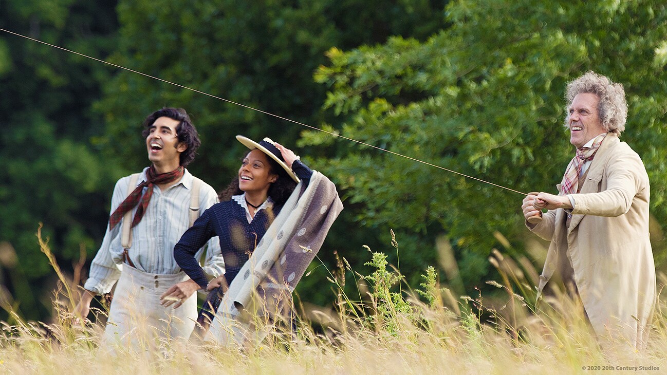 Actors Dev Patel, Rosalind Eleazar, and Hugh Laurie in the movie "The Personal History of David Copperfield"