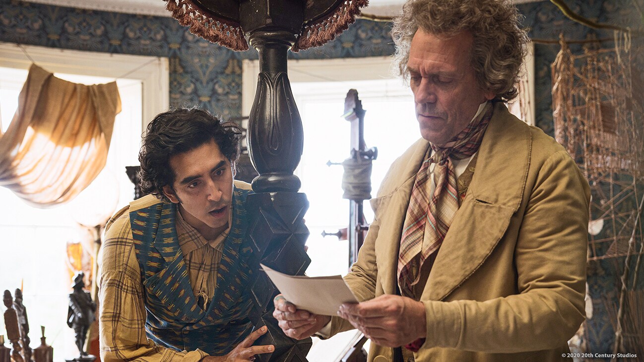 Actors Dev Patel and Hugh Laurie in the movie "The Personal History of David Copperfield"